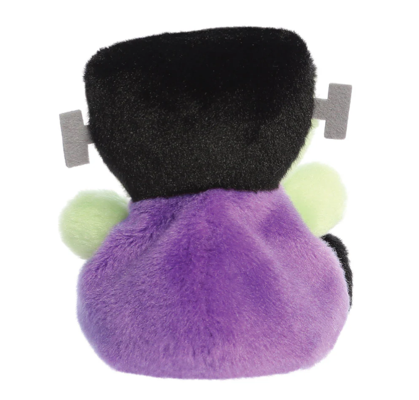 Palm Pals Plush toy resembling a Frankenstein character with black head, purple body, and green arms on a white background