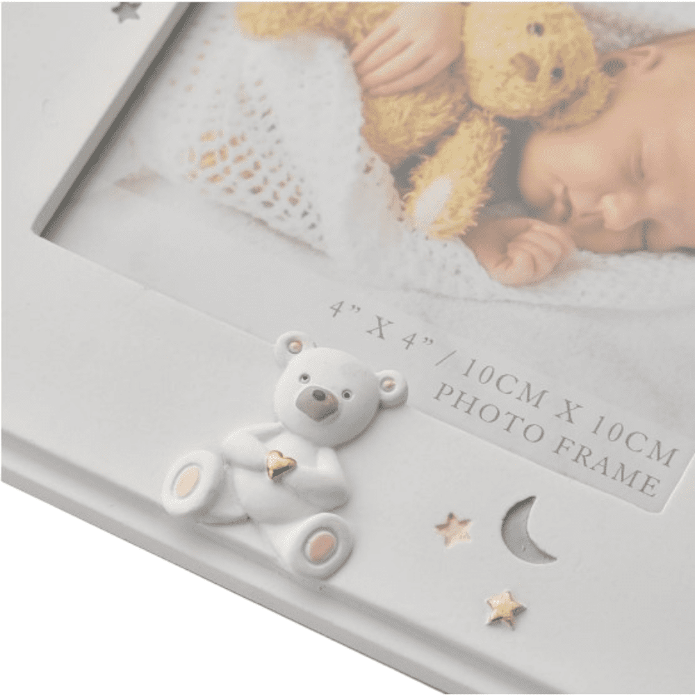 Details of the photo frame showing the bear, stars and moon