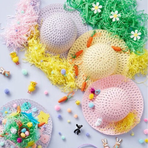 A craft kit including a bonnet, pom-poms, pipe cleaners, and Easter-themed decorations.