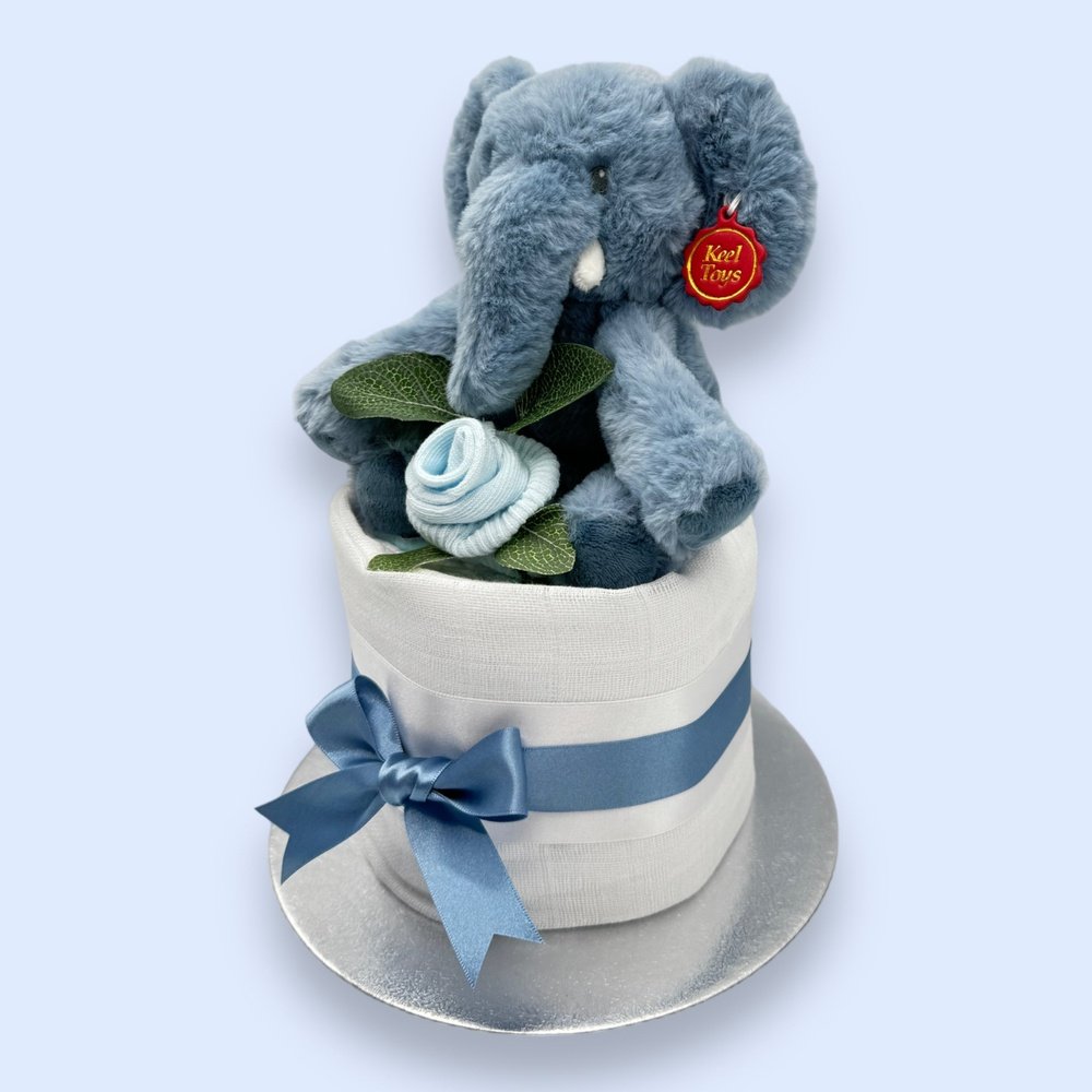Blue socks shaped into a rosebud in the Elephant Elegance Mini Nappy Cake