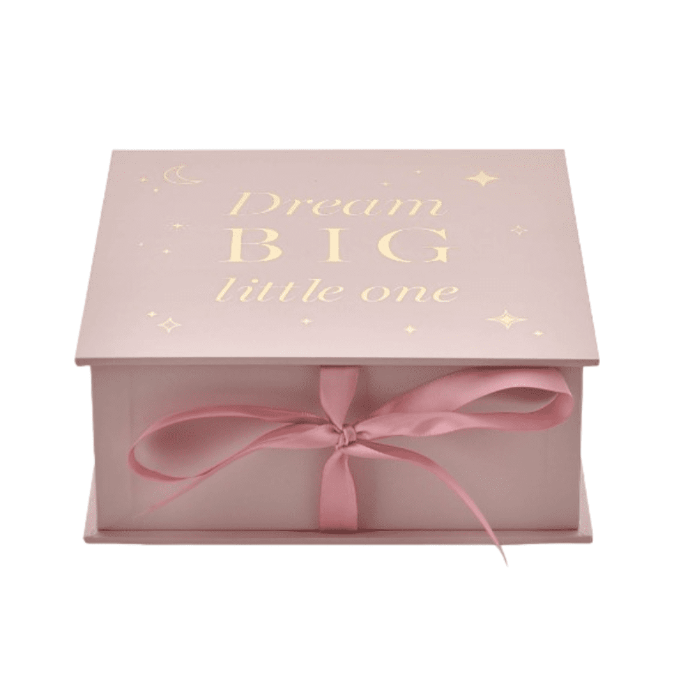 Pink keepsake box with gold details and 'Dream big little one' on the lid