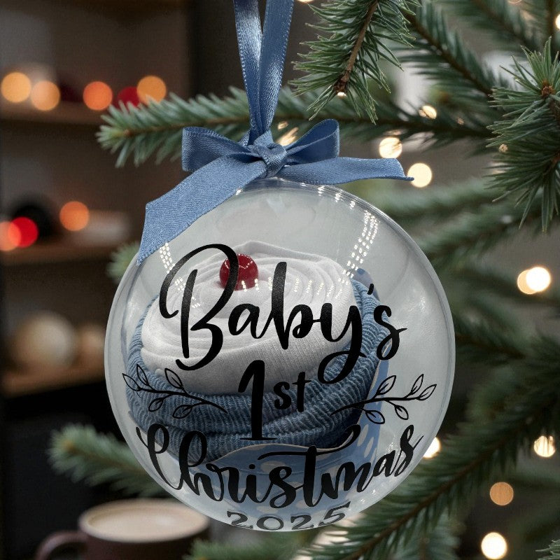 Christmas "Cupcake" Bauble with 'Baby's 1st Christmas' text and blue ribbon on a tree. 