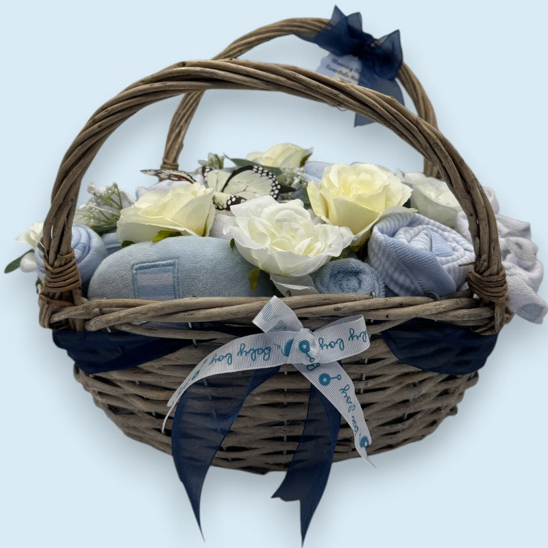 Baby gift hamper with flowers, leaves, butterfly, and organza ribbon
