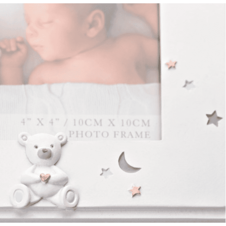 Details of the photo frame showing the bear, stars and moon