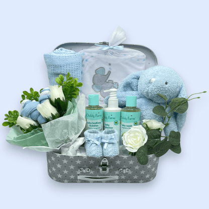 Childs Farm Baby Gift Set including a blanket, hooded towel, washcloths, socks, and a soft toy