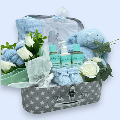 Childs Farm Baby Gift Set including a blanket, hooded towel, washcloths, socks, and a soft toy