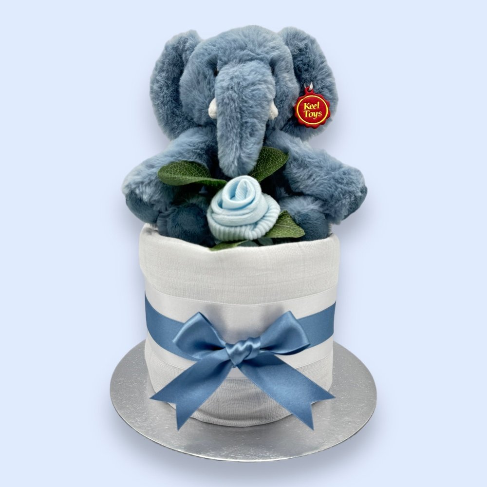 Elephant Elegance Mini Nappy Cake featuring premium nappies, blue plush elephant, and elegant ribbon