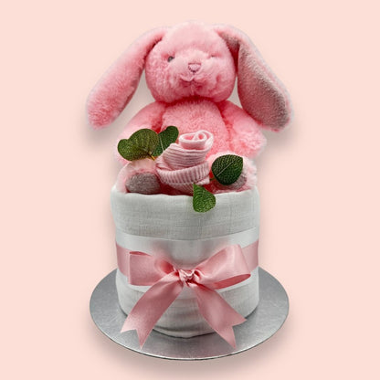 Pink Bunny Hugs Mini Nappy Cake. A delightful and practical baby gift