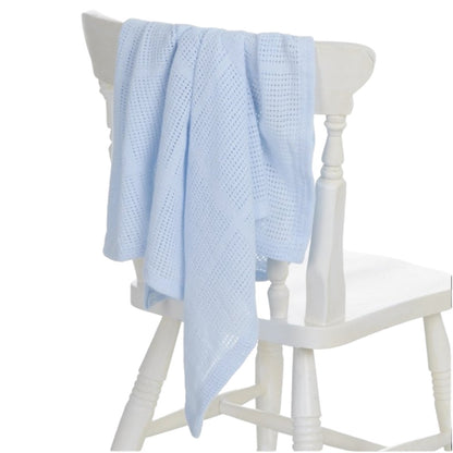 Blue cellular baby blanket styled as a new baby gift