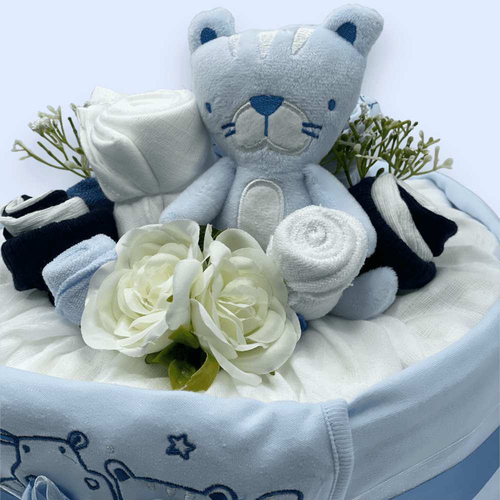 Close up of Tender Blooms 1-Tier Deluxe Nappy Cake in blue