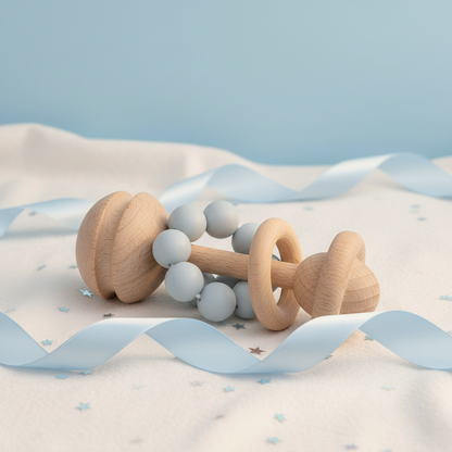 Blue silicone and wood teether styled as a baby boy gift