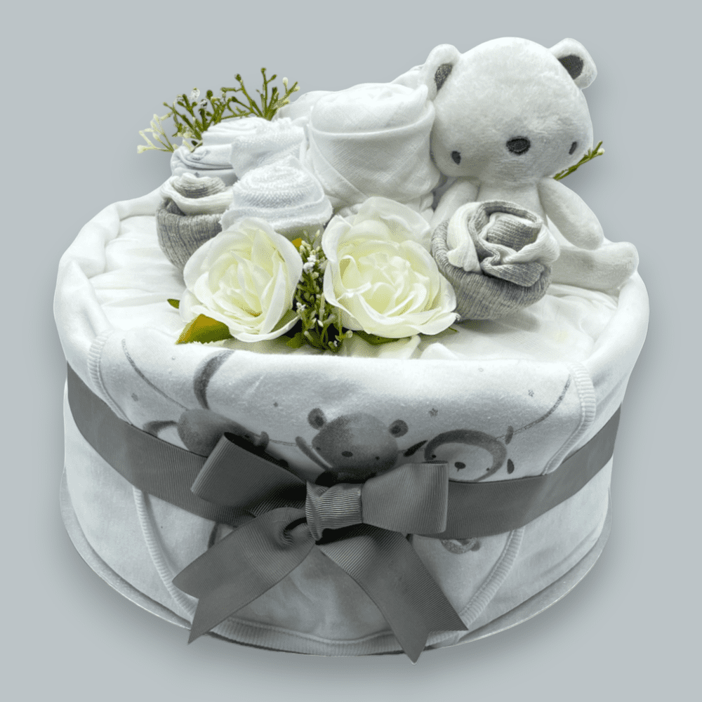 Elegant unisex baby nappy cake with clothing bouquet and soft toy