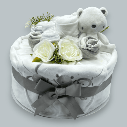 Elegant unisex baby nappy cake with clothing bouquet and soft toy