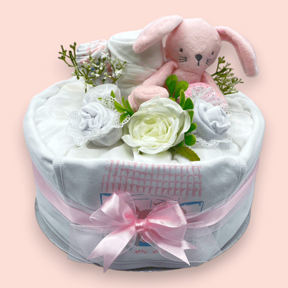 Handcrafted pink baby nappy cake – useful and beautiful newborn gift