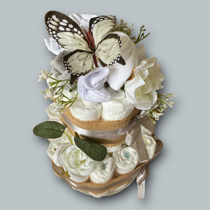 Side view of silver naked nappy cake with hessian wrap and Pampers nappies