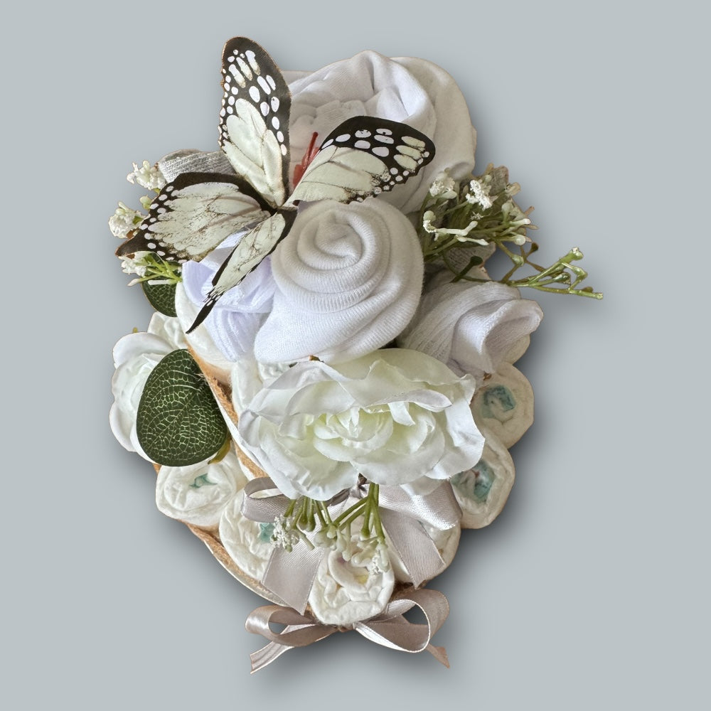 Top view of Silver naked nappy cake with hessian wrap and Pampers nappies