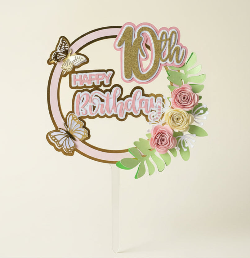 Personalised 10th birthday cake topper in blush pink and gold with flowers and butterflies
