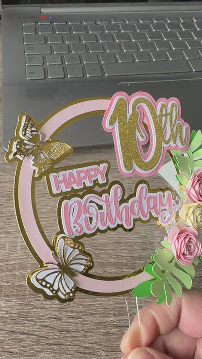 Handmade pink and gold 10th cake topper with layered text and butterflies